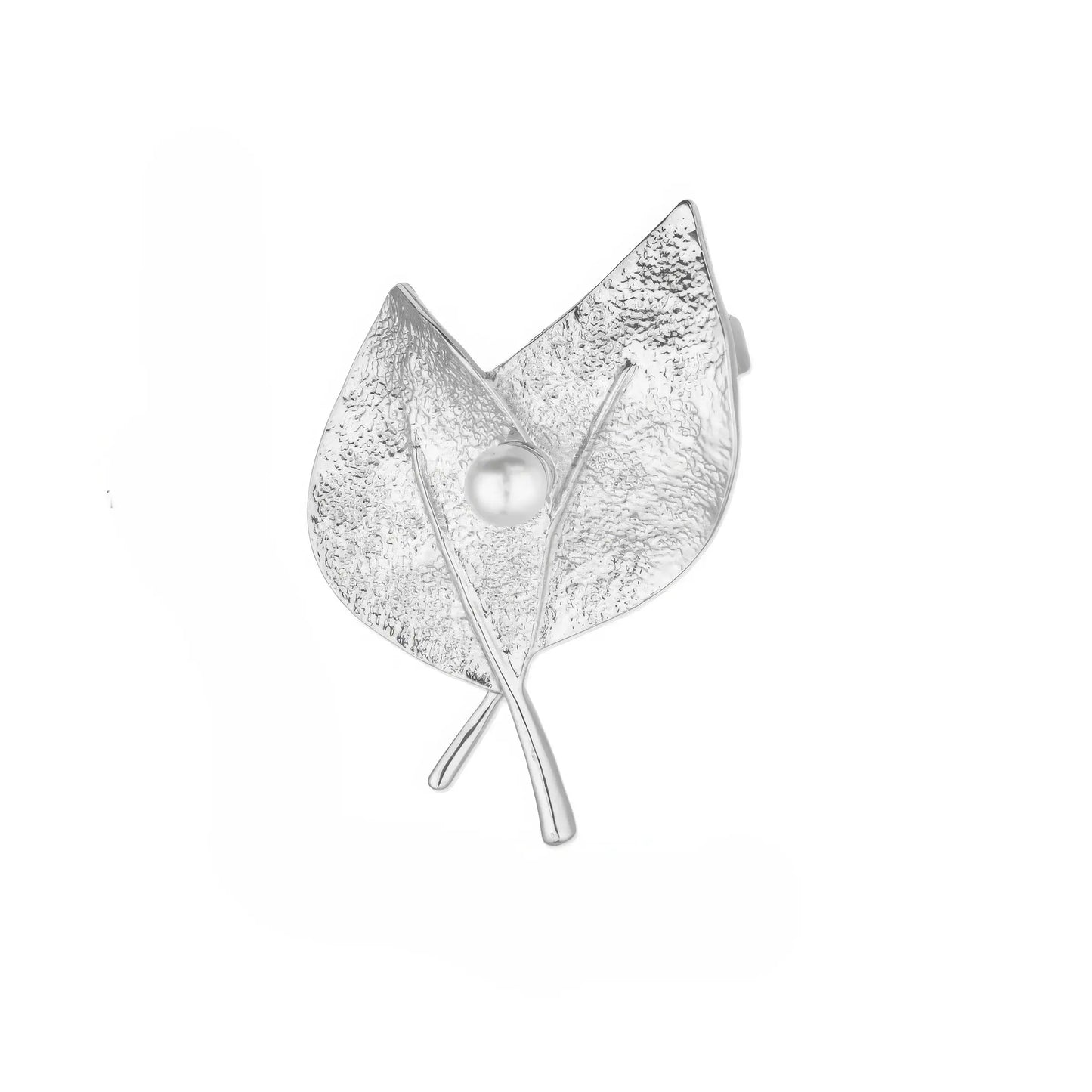 Silver leaf - shaped brooch with pearl, isolated on white background, highlighting texture