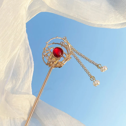 Magic Forest hairpin with red gem and gold tassels
