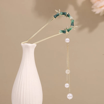 Muxin U - shaped hairpin 2 with flower design, light brown background with white vase and flowers