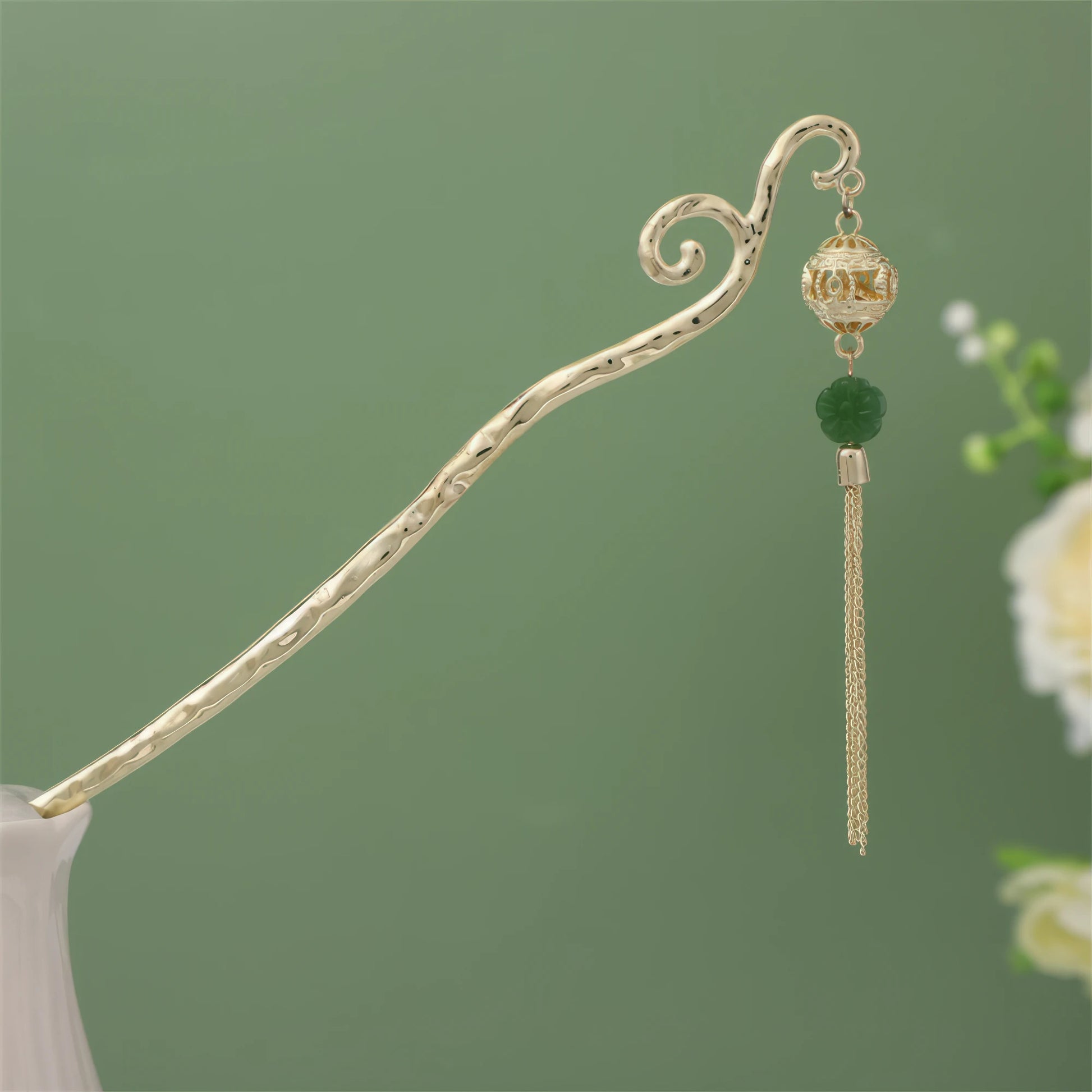 Nianchunxian hairpin with green bead and gold tassel, gold rod in white vase on green background