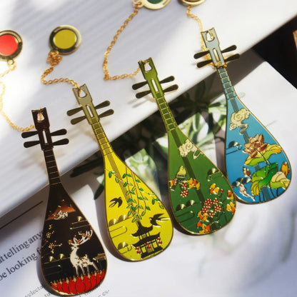 Assorted pipa - shaped bookmarks in different colors (black, yellow, green, blue) with unique patterns, shown laid out on a surface, each having a pendant chain.