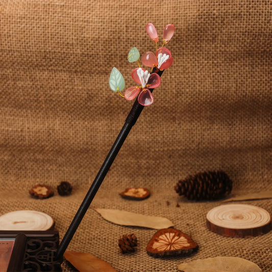 Shantaohong hairpin 1 with black rod, pink flower and white bead tassel, linen background with pinecone and wood chips