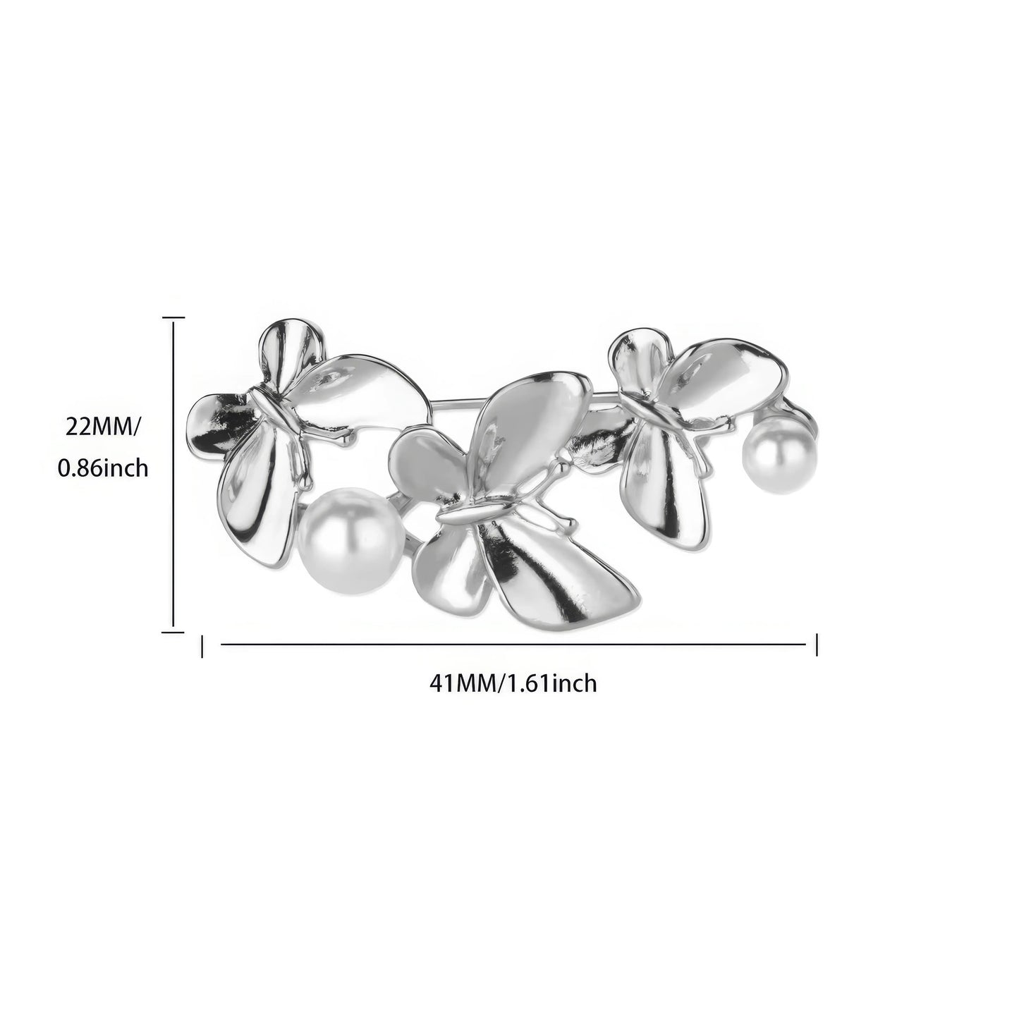 Gold and silver three - butterfly brooches with pearls, displayed on white curved surface, showcasing variety