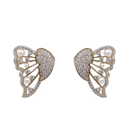 Gold two - way wear butterfly diamond earrings, isolated on white background