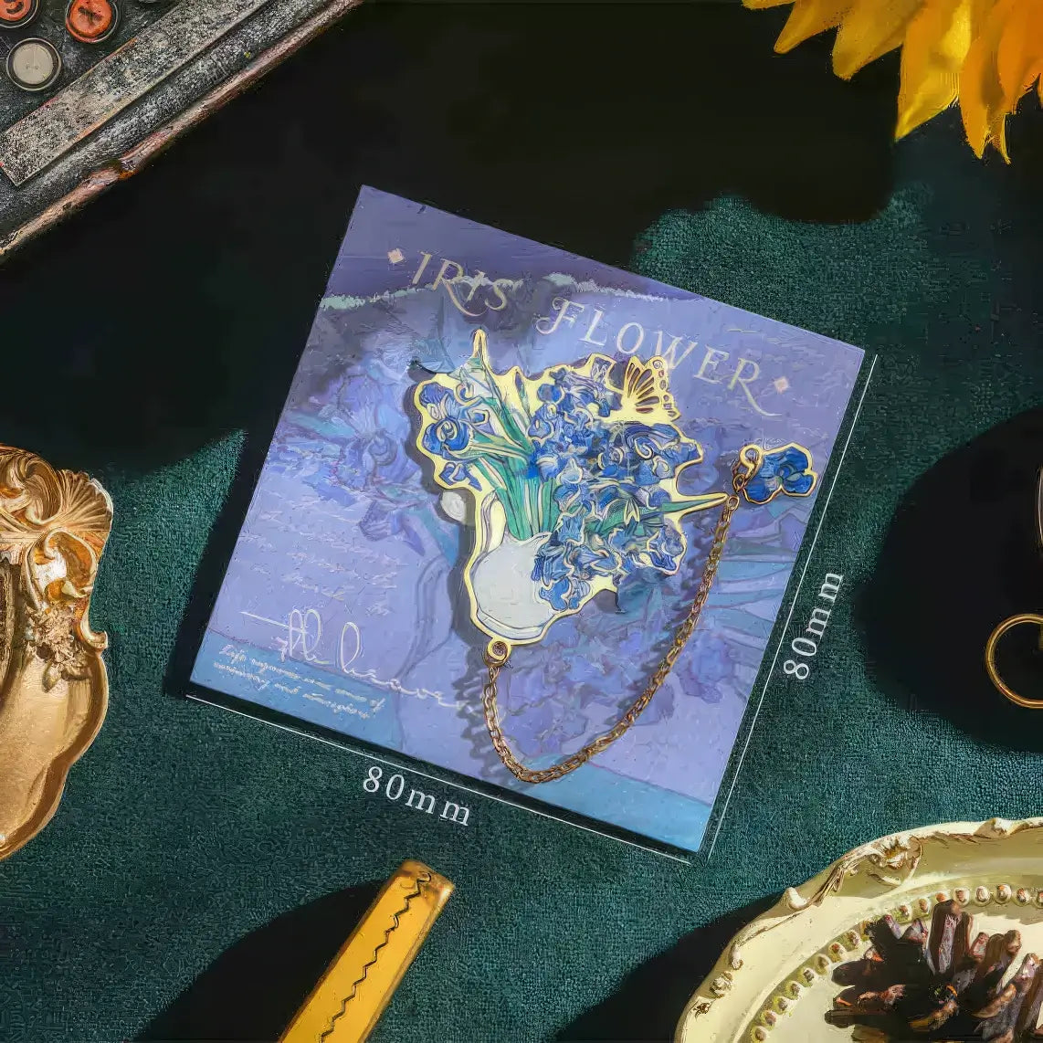 Van Gogh - inspired metal bookmark in a vintage - style setting with old books and a parchment, detailed product photography style, 4:3 ratio