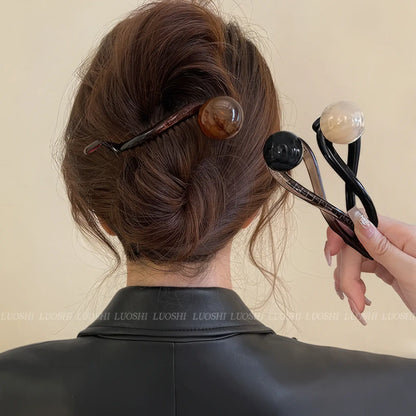 Vintage brown bead twist clips worn in updo hairstyle (multiple clips)