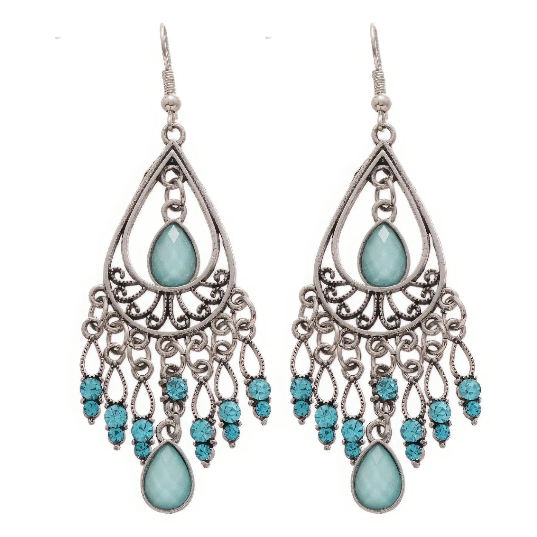 Water drop tassel earrings, blue stones with silver - tone filigree, isolated on white background (close - up)