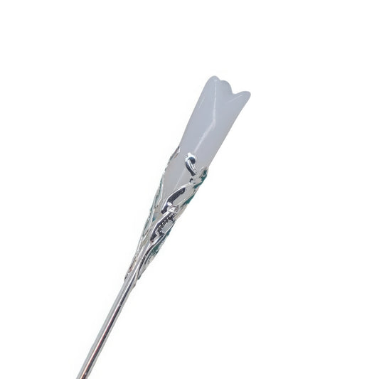 Gray - petal white magnolia hair pin, isolated on white background