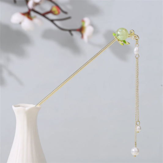 The eighth hairpin in the Yaomingyue hairpin set, having a gold rod and multiple flower - related decorations, presented in a white vase against a light - gray background with floral elements