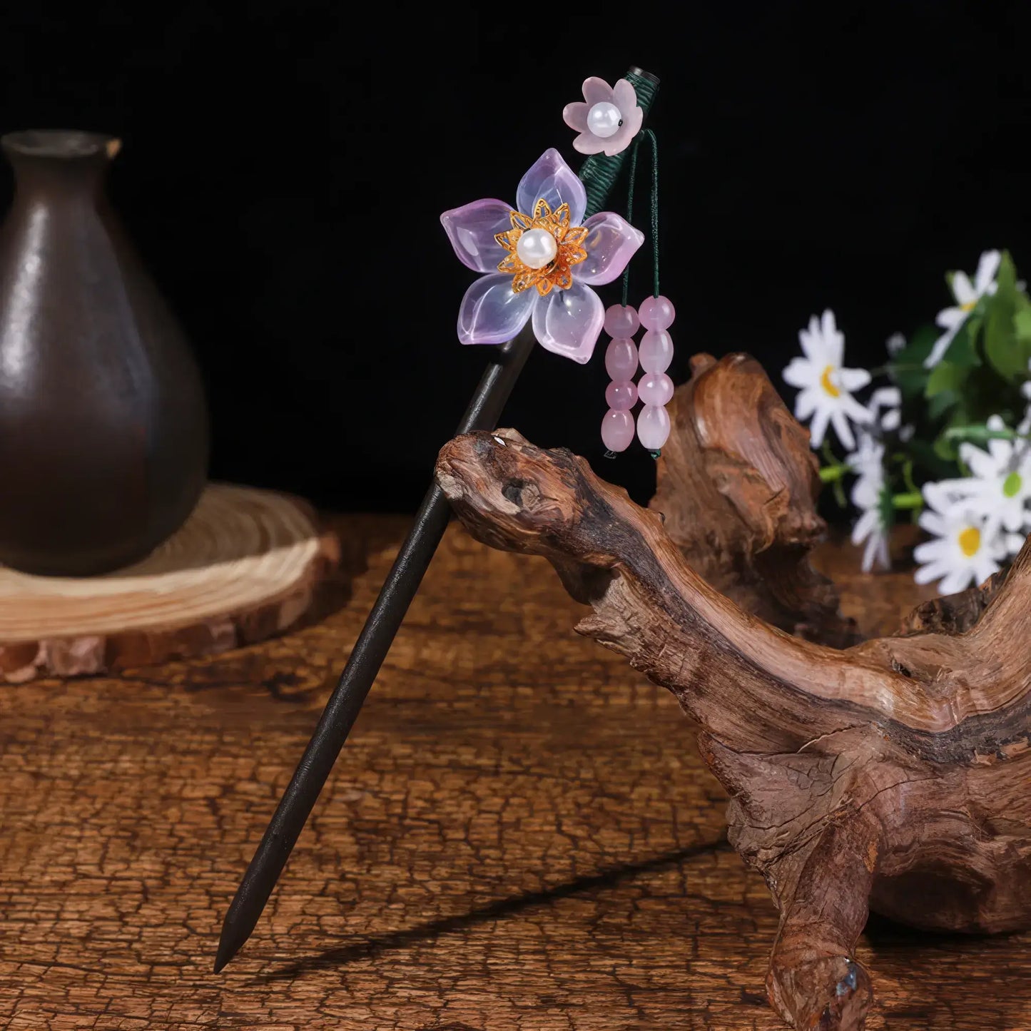 Yaotiao hairpin with purple flower and bead tassel, dark background with vase and daisies
