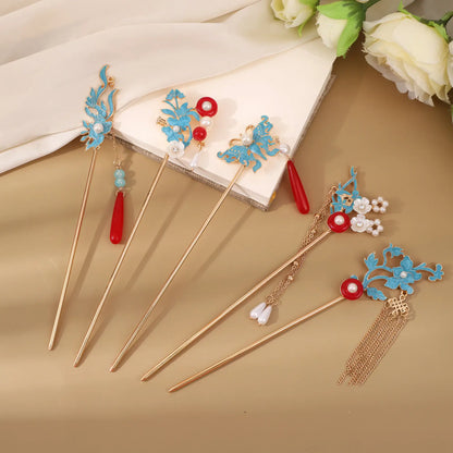 Set of Yinchenque hairpins with blue florals and red accents